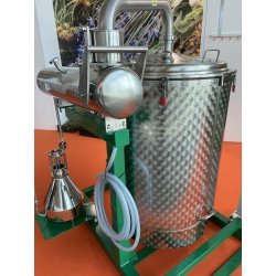 Extractor destilador de aceites esenciales industrial con cuba basculante de 500 Lt para plantas, hierbas y flores