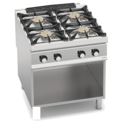 Cocina a gas industrial 4 fuegos Max Power sobre mueble y fondo de agua Berto's S900